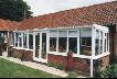 White PVCu lean to conservatory